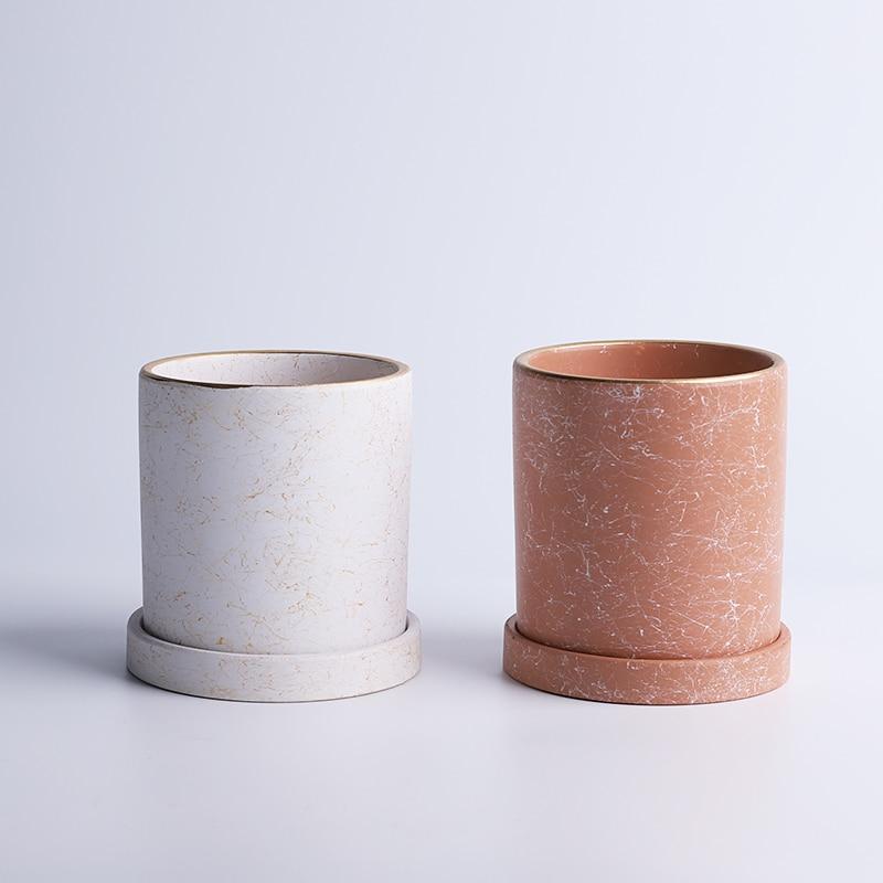 a couple of cups sitting next to each other on a table